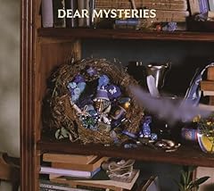 雨粒をつけたまま